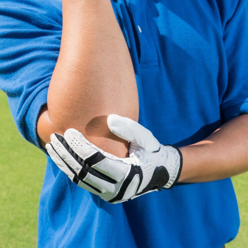 Golfer,Elbow,Pain,During,The,Game,,Muscle,Injury,Concept.